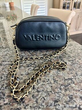 Authentic Valentino Black Leather bag gold chain leather strap.